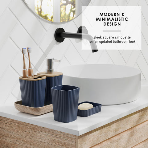 Clara Clark navy blue tumbler for rinsing and cohesive styling.
