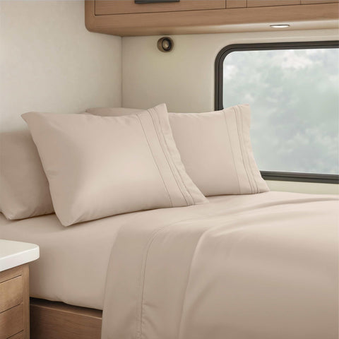 Clara Clark RV Queen low-profile fitted sheet secures to mattresses up to 10 inches.