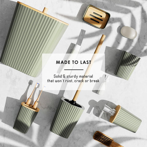 Clara Clark sage green trash can keeps waste discreet and tidy
