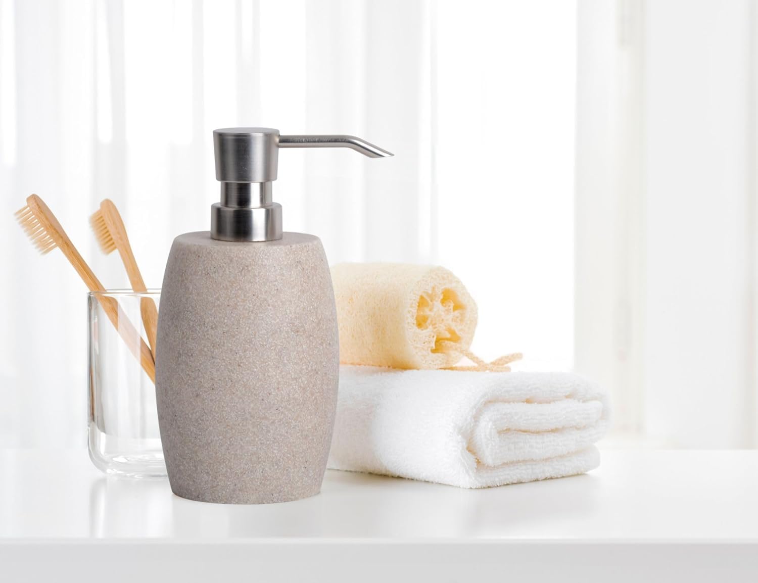Minimalist beige tone brings calm to sinks and countertops.