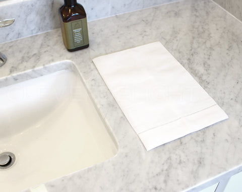 CleverDelights linen towels showcase decorative kitchen and bathroom styling.