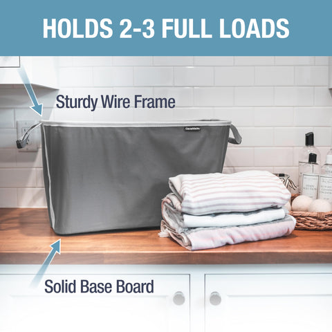 CleverMade collapsible laundry basket folded flat for compact storage