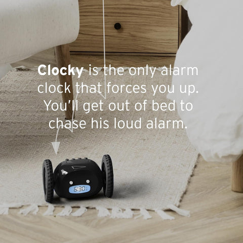 CLOCKY rolls away from bedside after alarm to wake you.