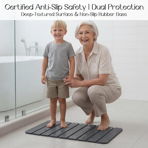 Closefriend grey textured stone bath mat with slip-resistant surface for stable steps.
