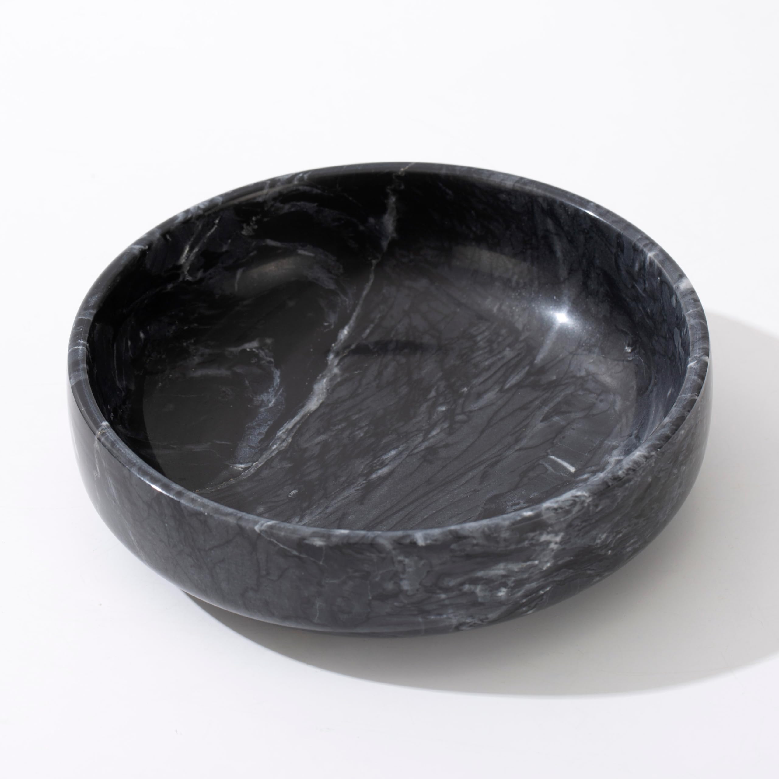 CM CHIC MONDAY entryway marble bowl keeps coins and keys neatly organized.