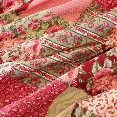 Bedroom setup featuring CMFshape floral quilt for romantic ambiance
