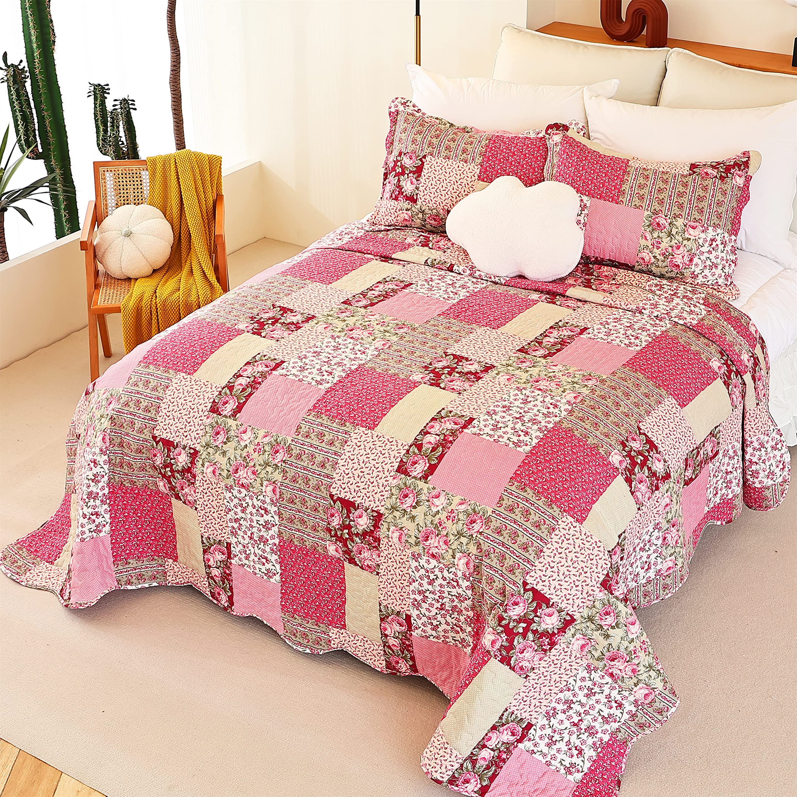 Close-up of pink floral patchwork showing romantic quilt details
