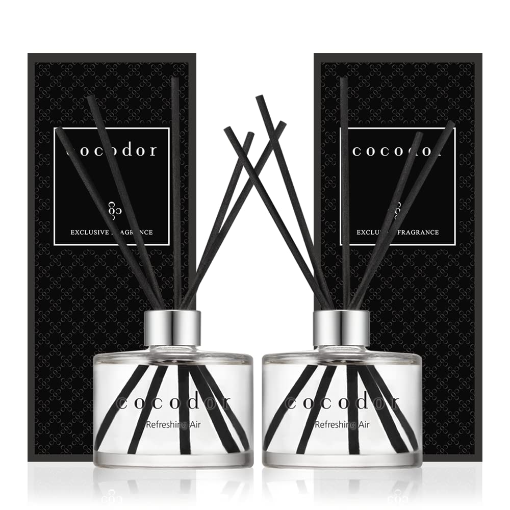 Cocodor Signature Reed Diffuser Set bottles offer long-lasting mandarin citrus and cotton fragrance.