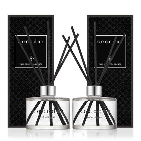Cocodor Signature Reed Diffuser Set bottles offer long-lasting mandarin citrus and cotton fragrance.