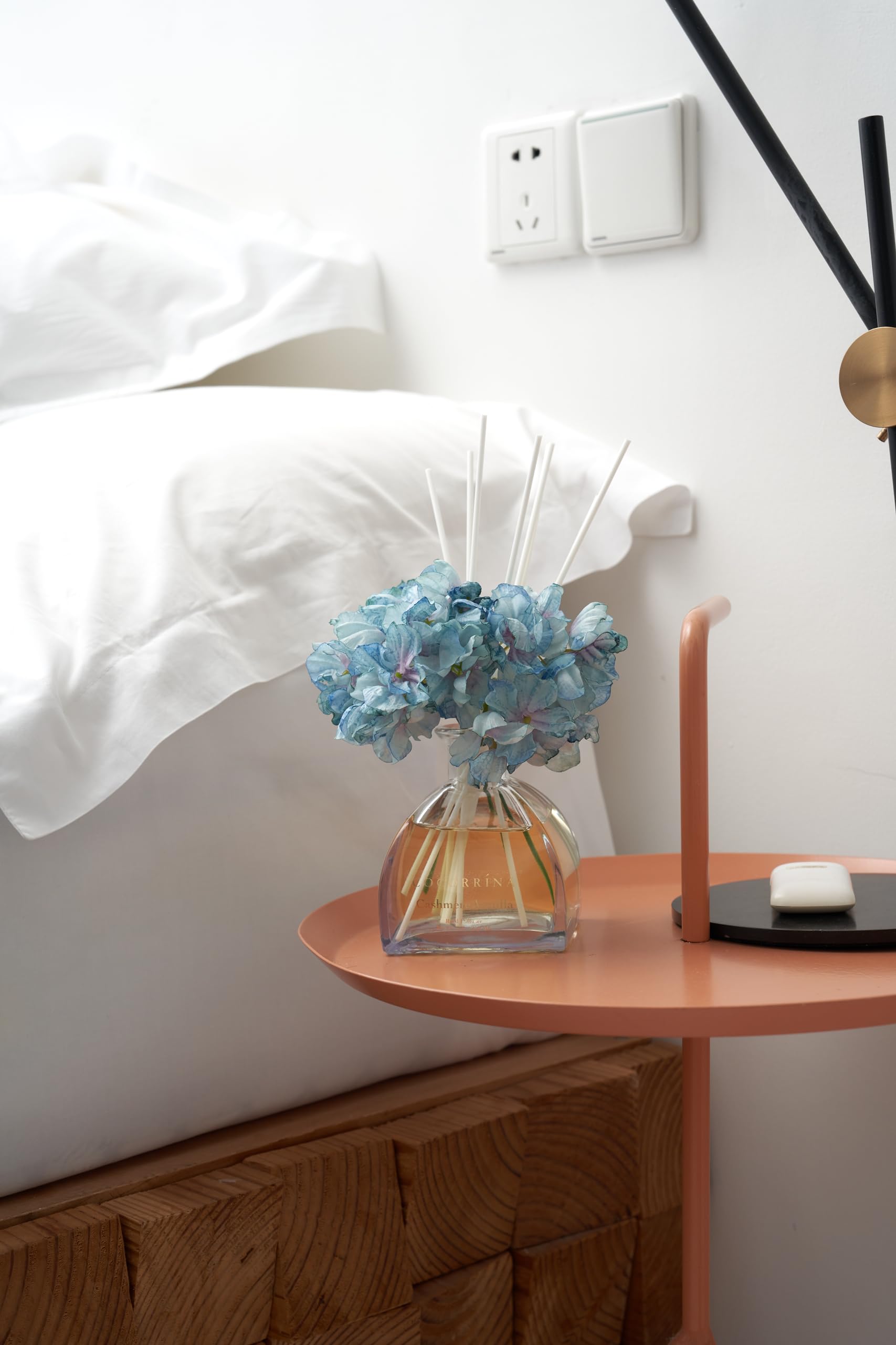 Cocorrina diffuser sticks arranged for balanced fragrance release.