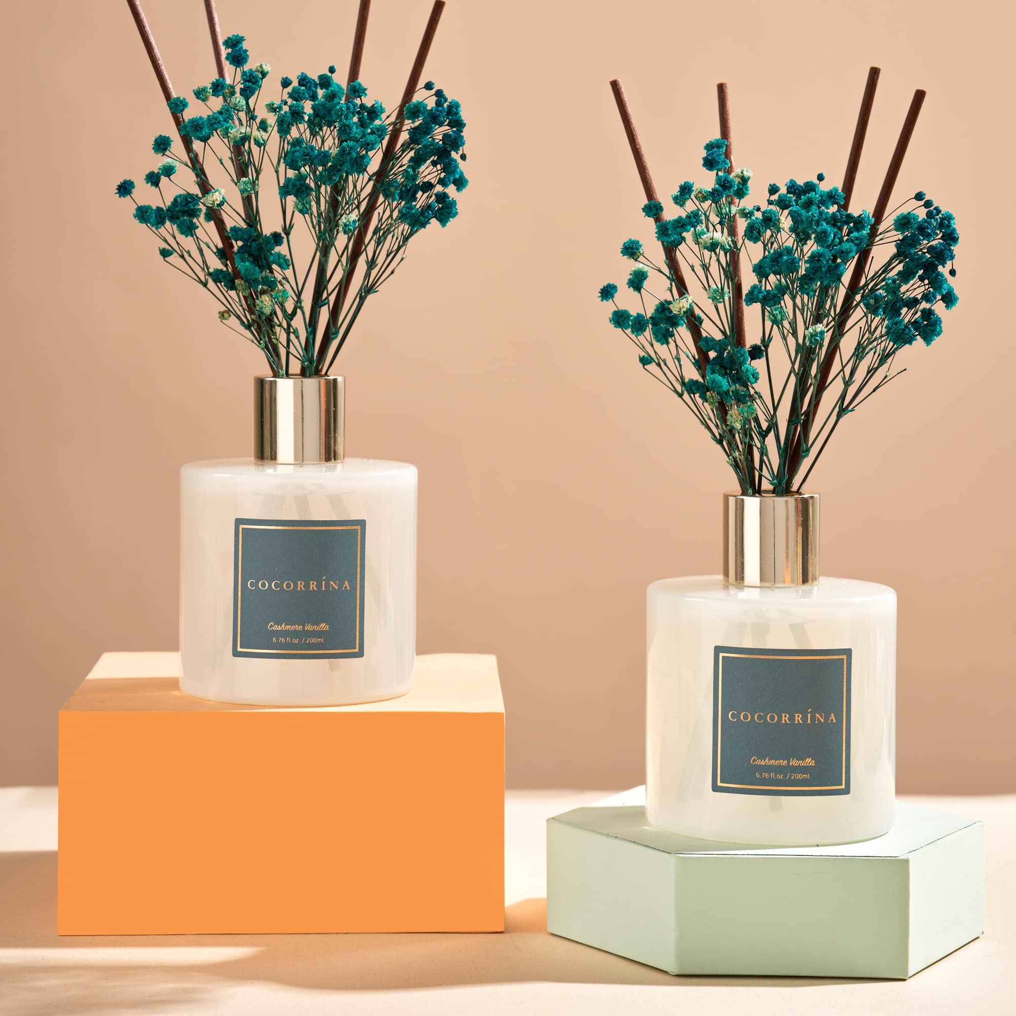 Close-up of Cocorrína vanilla cashmere reeds diffusing a warm fragrance
