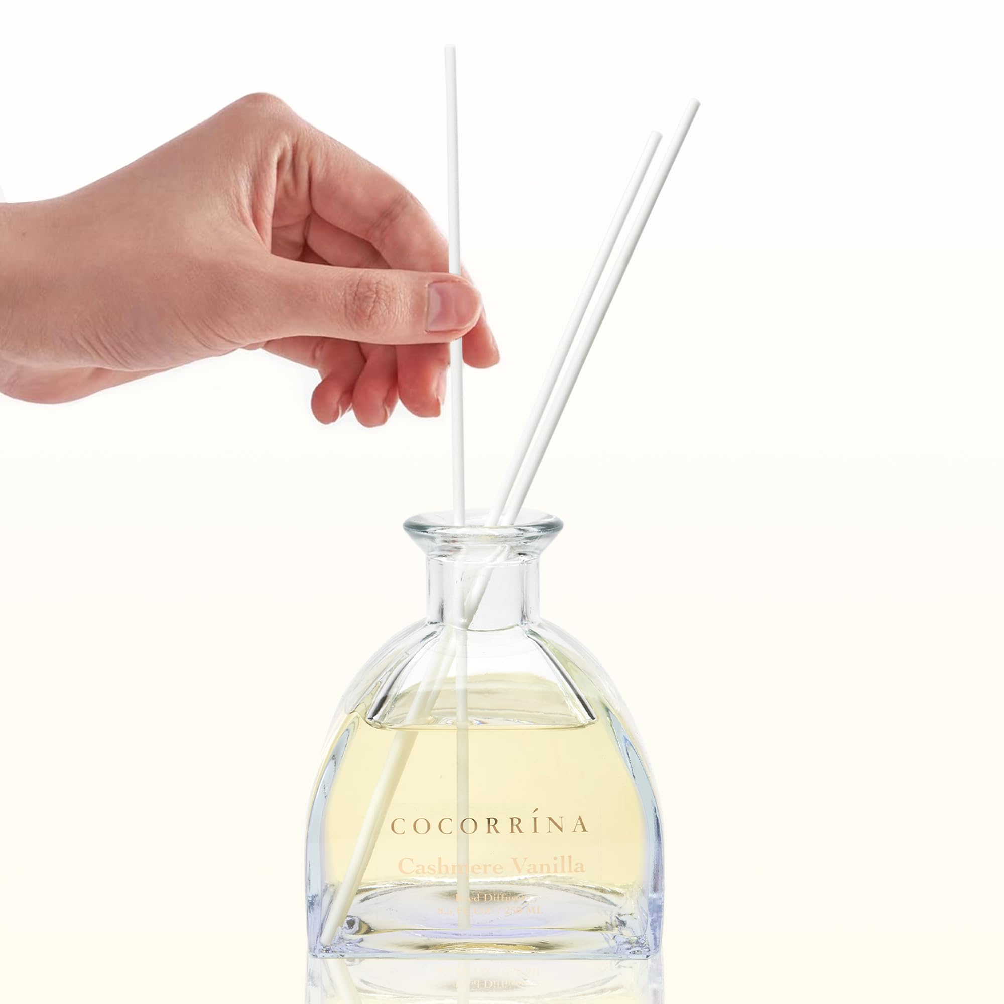 COCORRÍNA Yurt-inspired Reed Diffuser front view adds cultural flair to a shelf.