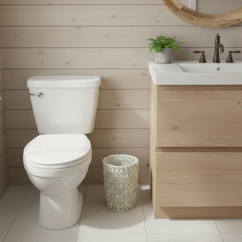 Coeusy wicker trash bin in cream white complements bathroom decor with a tidy, compact silhouette.