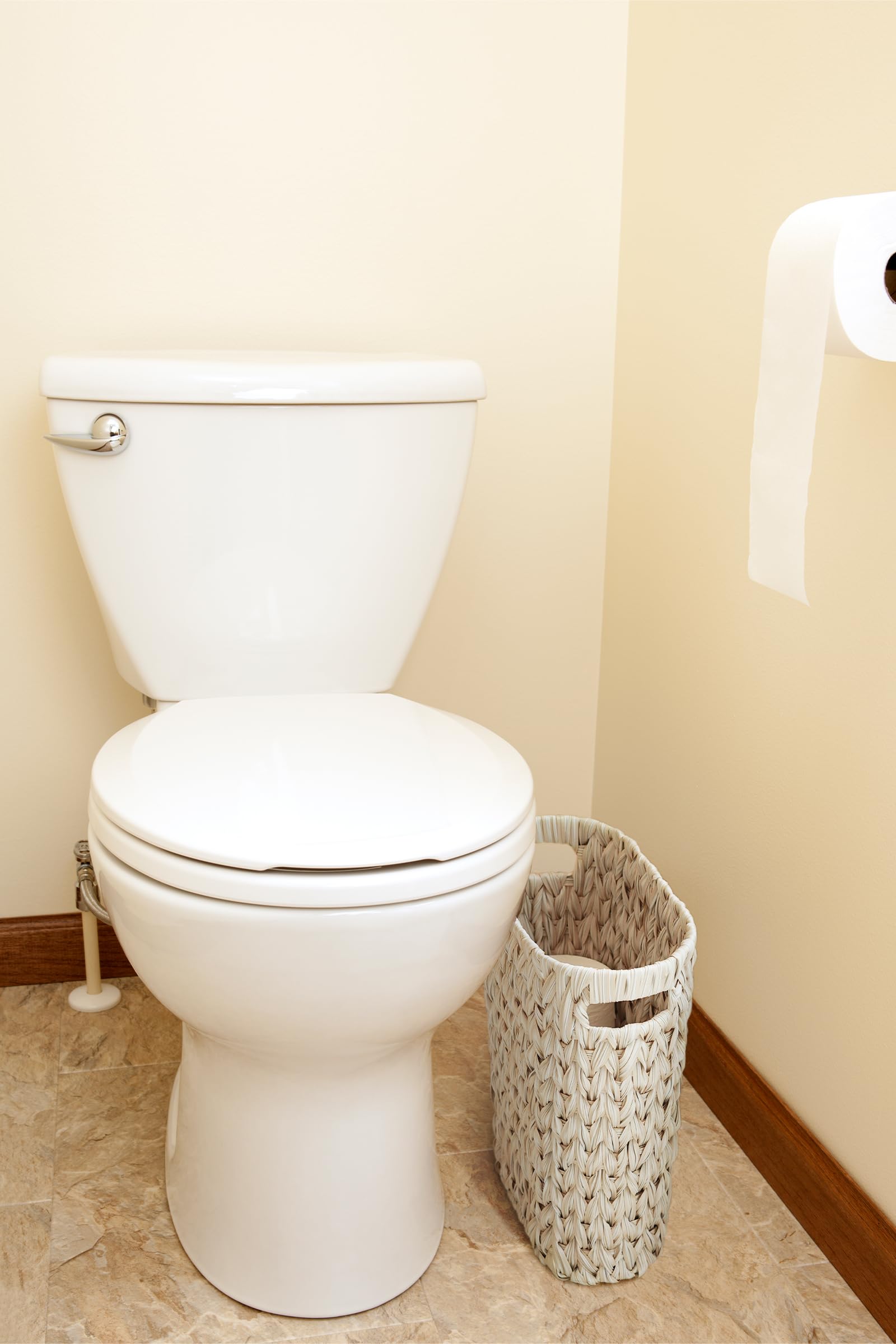 Coeusy wicker waste basket complements decor with subtle texture.