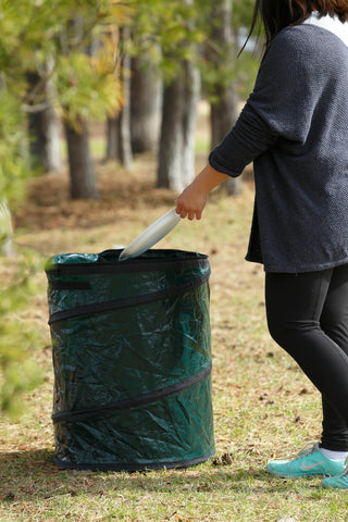 Coghlan's pop-up trash bin collapsed for compact storage after a family trip.