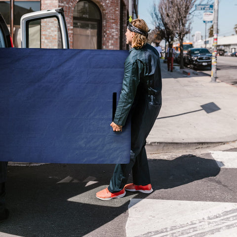 Coldwind tarp-material mattress bag withstands repeated use during moves.