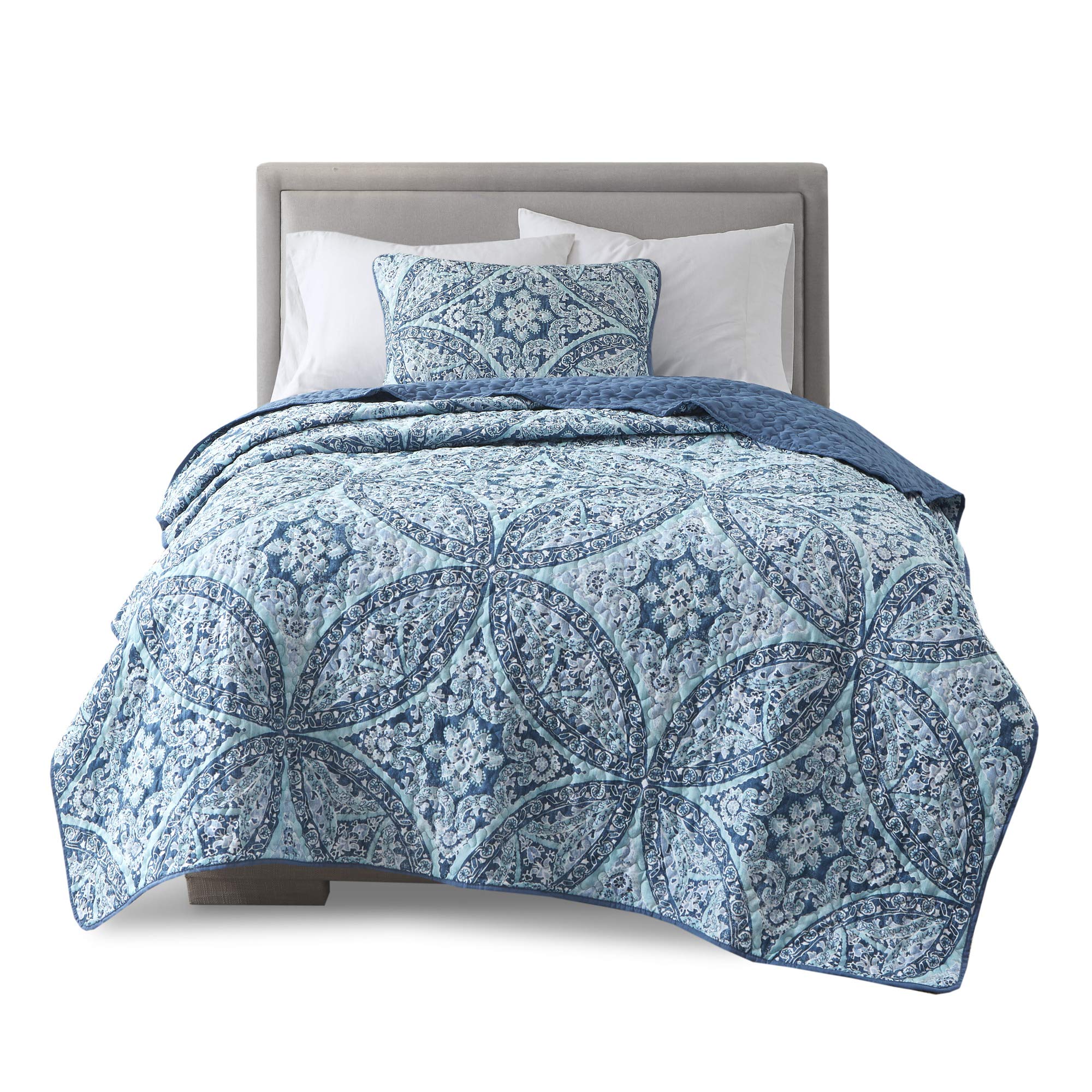 Cozy Comfort Spaces Gloria bedroom scene with aqua tones and contemporary styling
