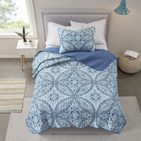 Gloria medallion pattern shams coordinate with the coverlet for a modern look