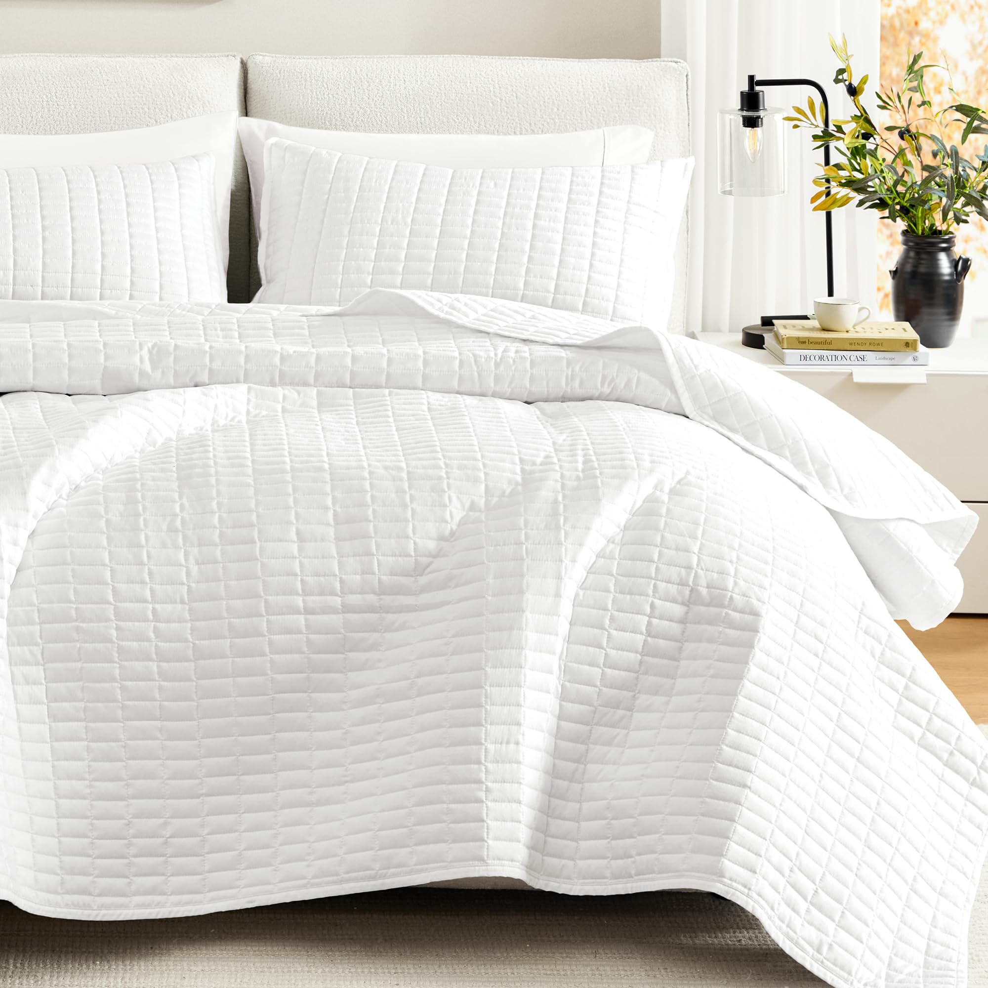 Comfort Spaces Kienna coverlet 90x90 on a neatly made full/queen bed for year-round layering