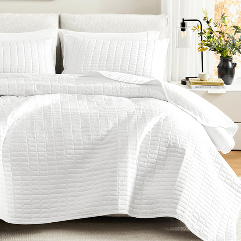 Comfort Spaces Kienna coverlet 90x90 on a neatly made full/queen bed for year-round layering
