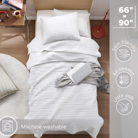 Kienna quilt stitching detail showcases textured pattern and durable construction.