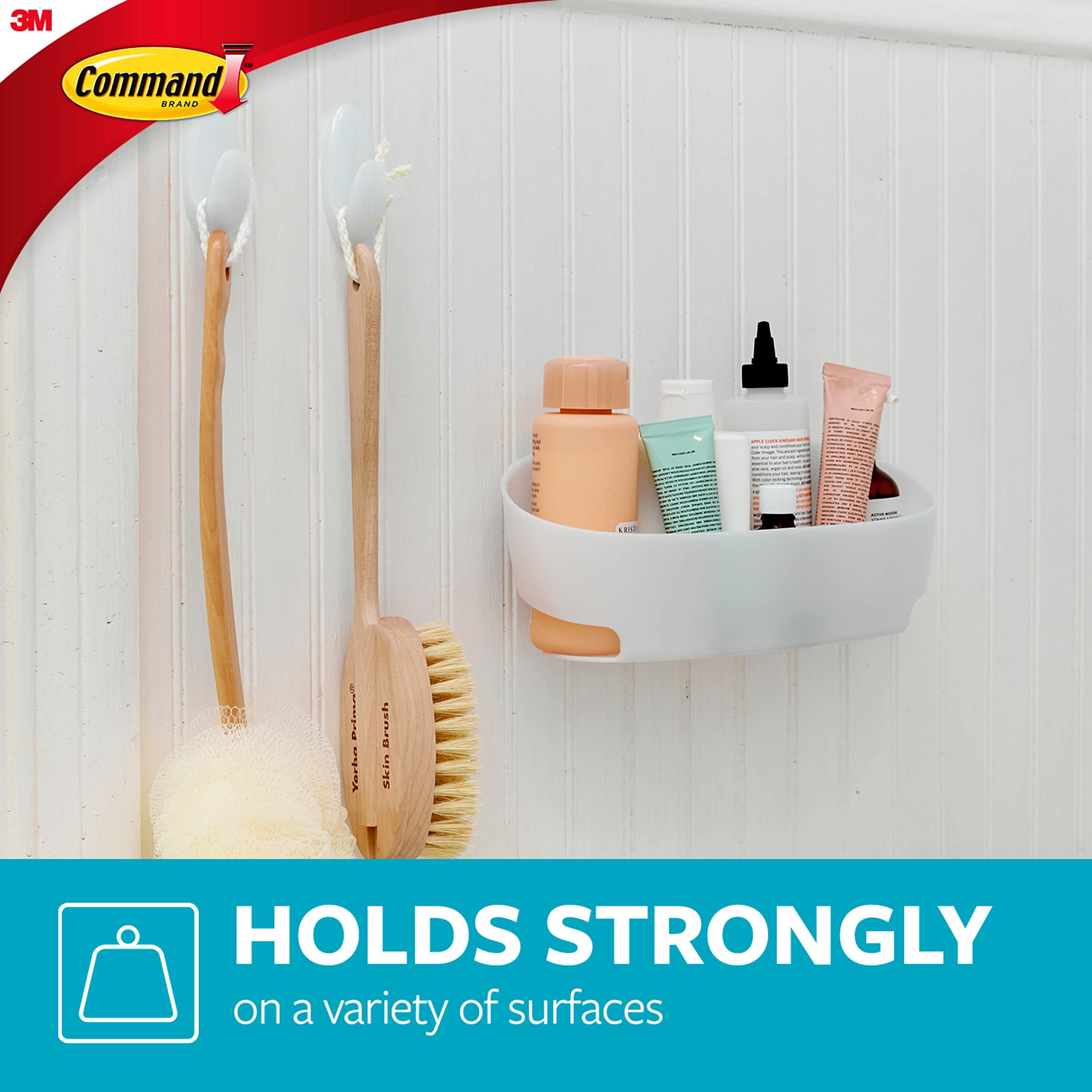 Command bath set toothbrush holder keeps daily essentials near sink.