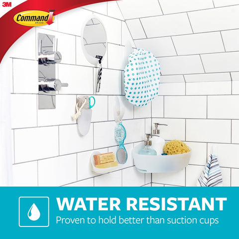 Command bath set wall mounting bases allow easy repositioning.