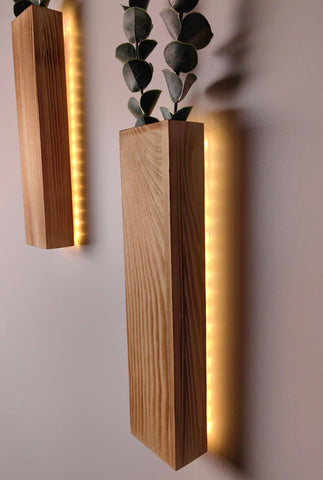Comtelek four stems of faux eucalyptus illuminate shelves and wall nooks, adding greenery.