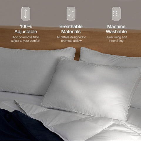 Coop Home Goods Essence pillow fill detail shows fluffy down-alternative fibers preventing lumping.