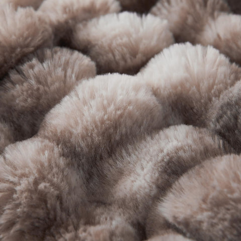 COOVA bedroom-ambience throw enhances cozy movie nights.