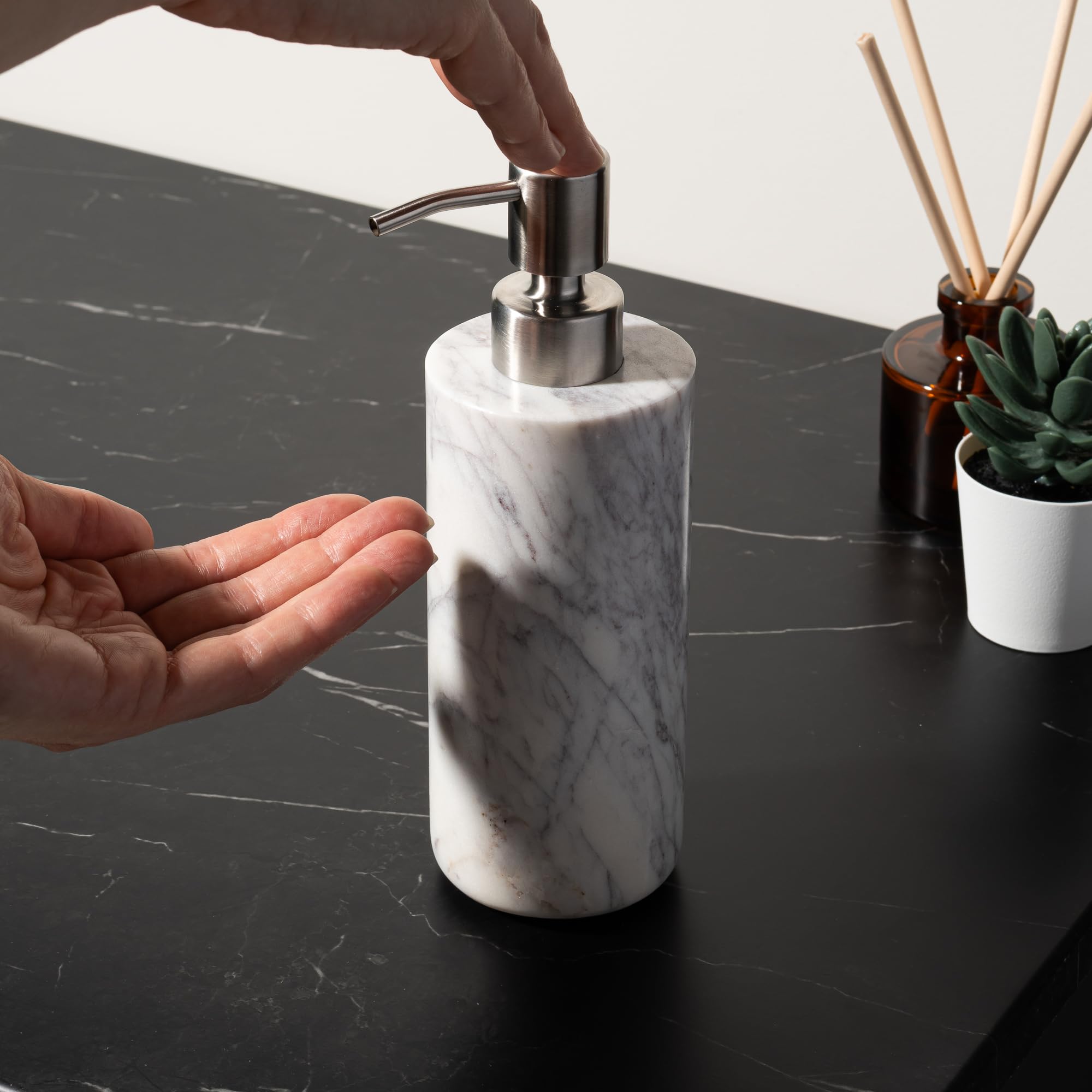 Cork & Mill marble countertop decor on a clean bathroom surface