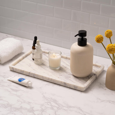 Cork & Mill marble tray on the kitchen counter adds elegance for oils and bottles.