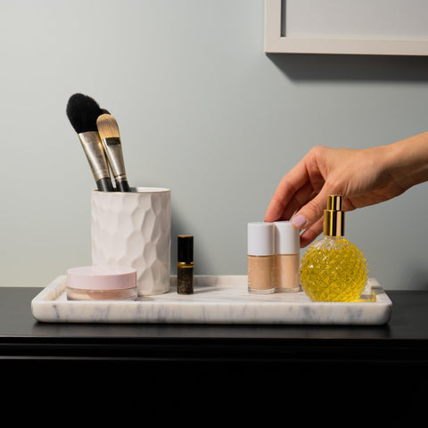 Cork & Mill marble tray for perfume display adds a refined focal point.