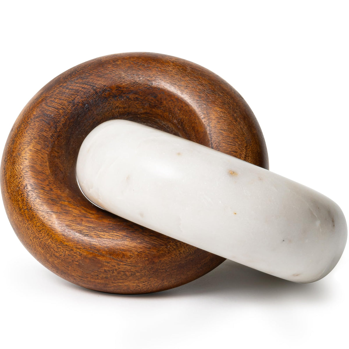 Cork & Mill marble and wood knot decor on a shelf adds modern elegance