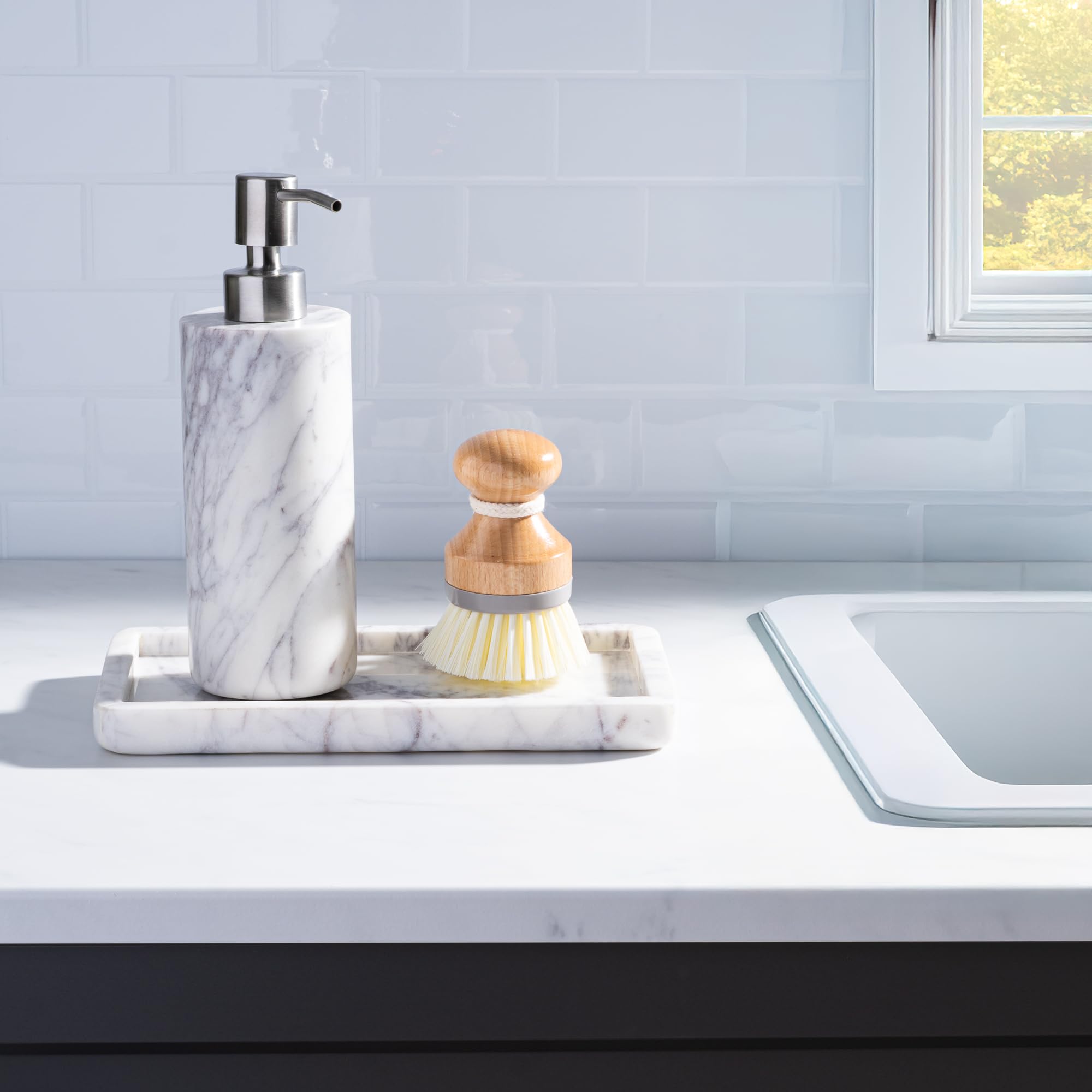 Close-up reveals natural veining in Cork & Mill marble dispenser.