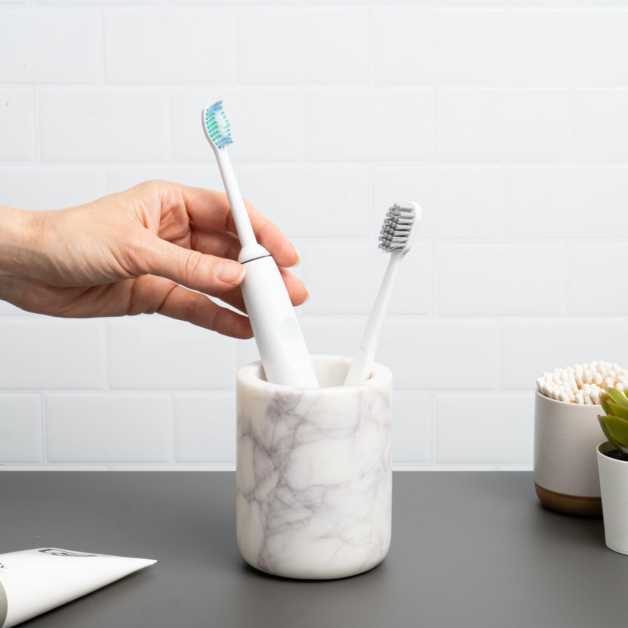 Cork & Mill marble toothbrush holder close-up showing premium stone