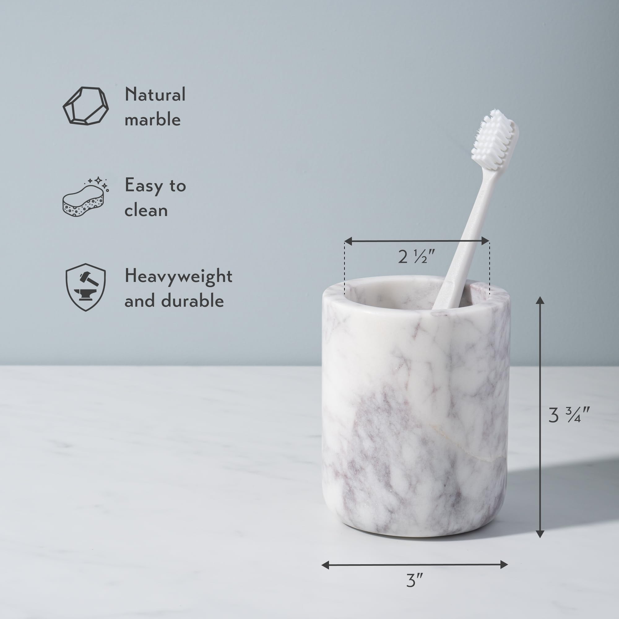 Cork & Mill marble toothbrush holder side view on bathroom counter