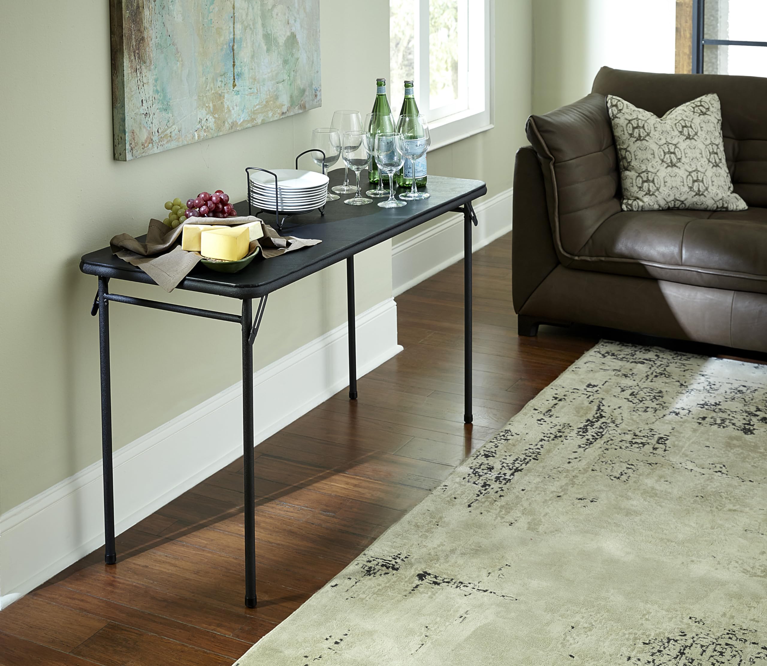 Cosco folding table in flat storage pose, easy to tuck away.