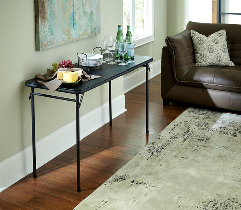 Cosco folding table in flat storage pose, easy to tuck away.