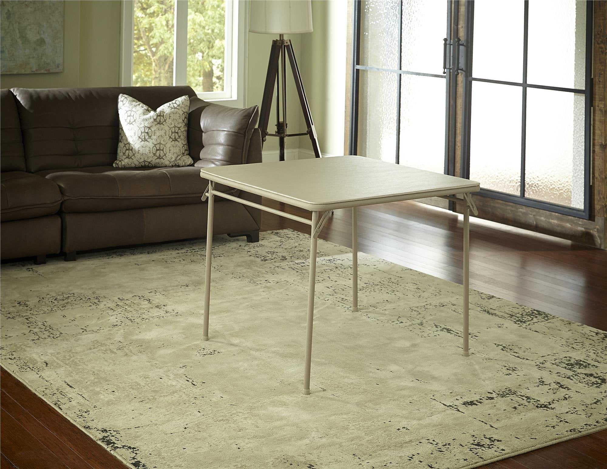 Cosco folding legs collapse to 1.5 inches for compact storage.