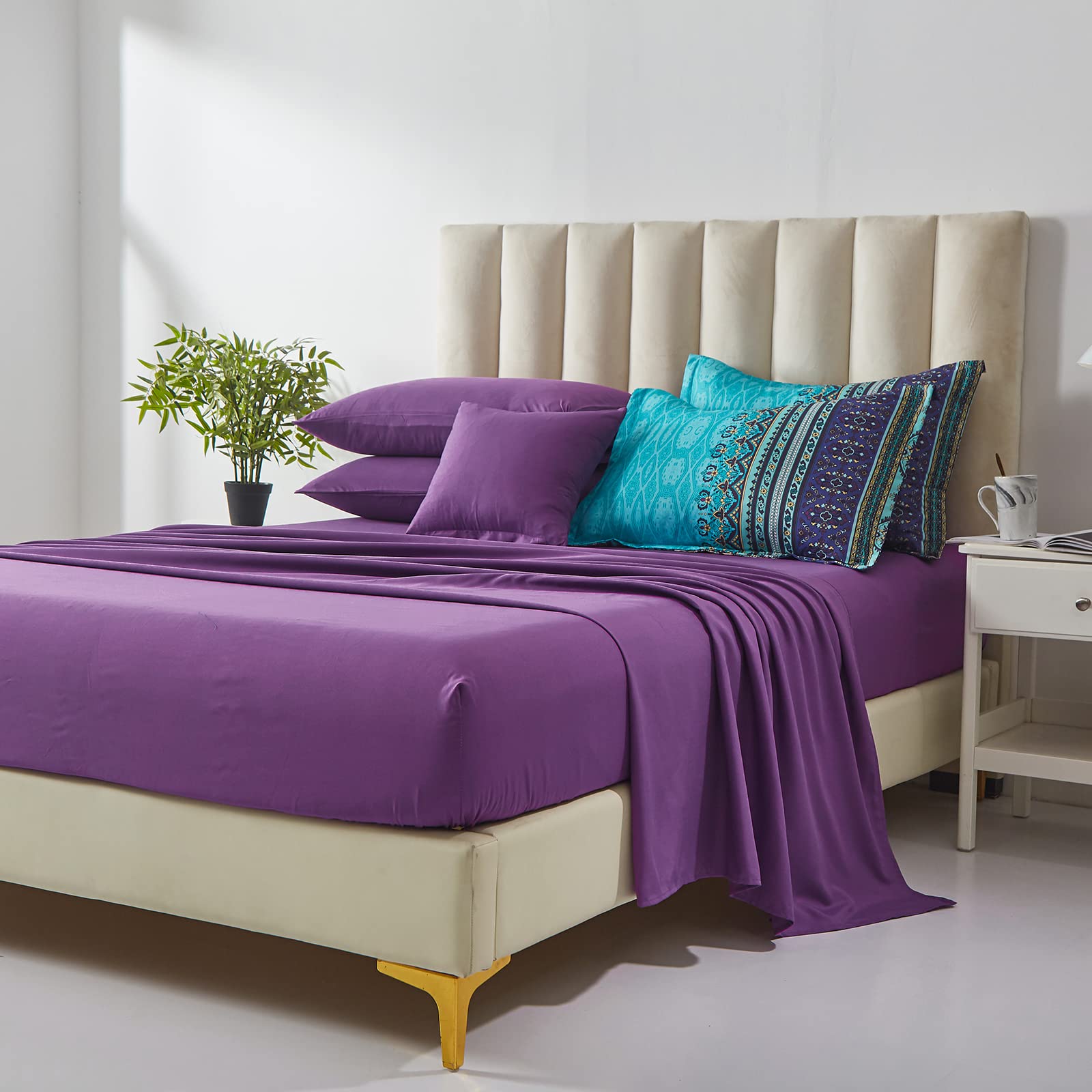 Cottolester Boho bedroom ambience with aqua paisley styling for a refreshed look.
