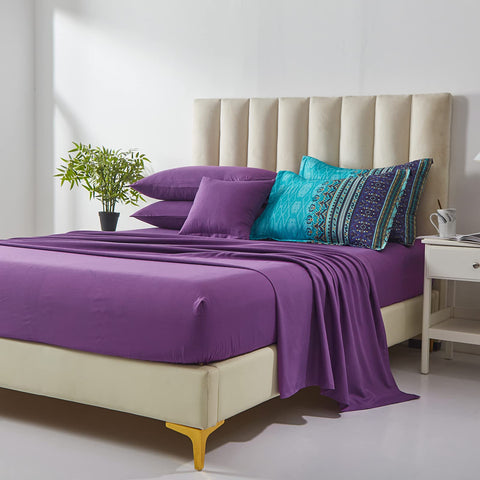 Cottolester Boho bedroom ambience with aqua paisley styling for a refreshed look.