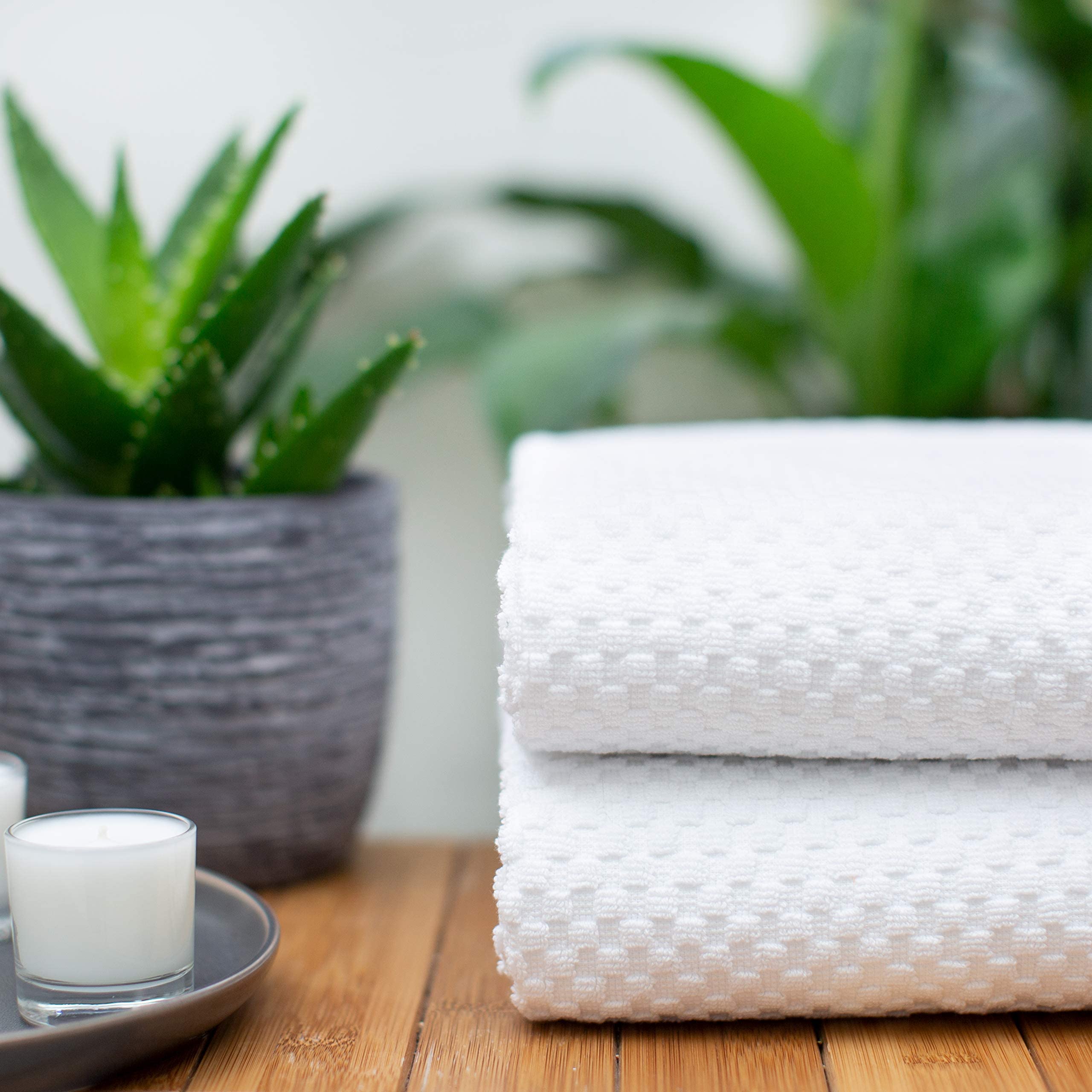 Cotton Craft bath sheets demonstrating easy care and machine washable design.
