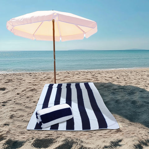 COTTON CRAFT Big Kahuna towel in Navy Cabana Stripe adds chic poolside style.