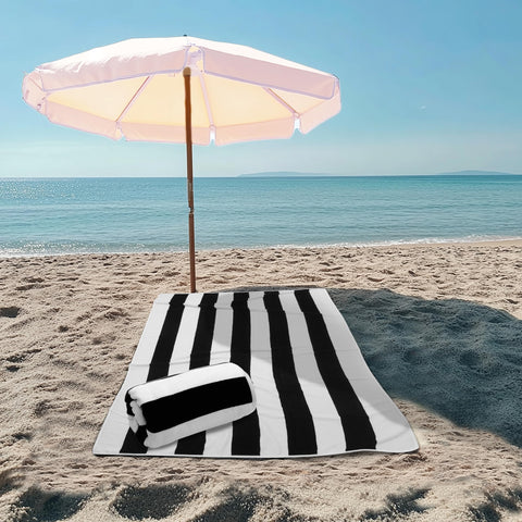 Cotton Craft dobby velour top towel offers plush, comfortable beach lounging.