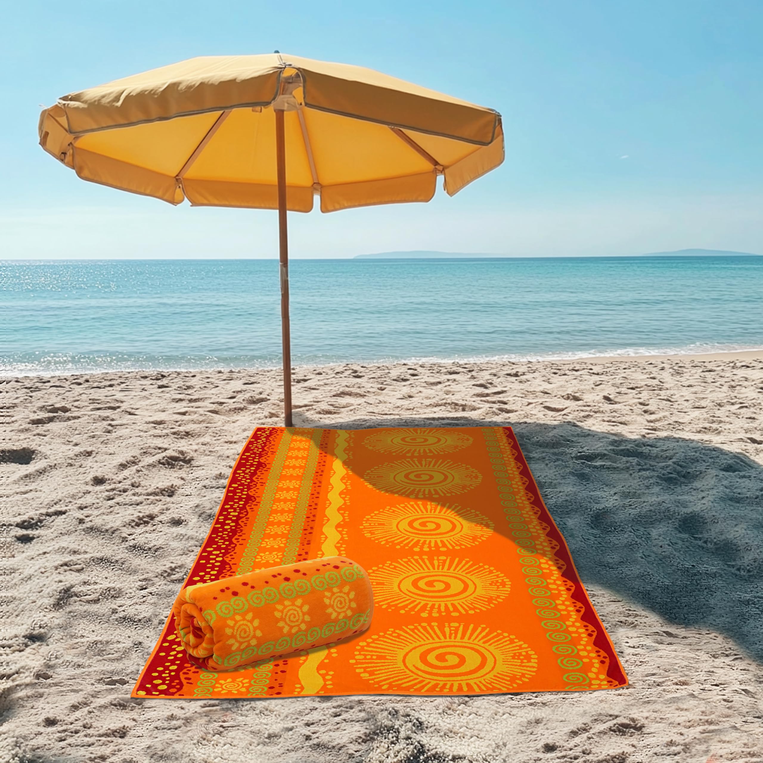 Cotton Craft two-pack XXL beach towels poolside view highlighting vibrant color and generous coverage.