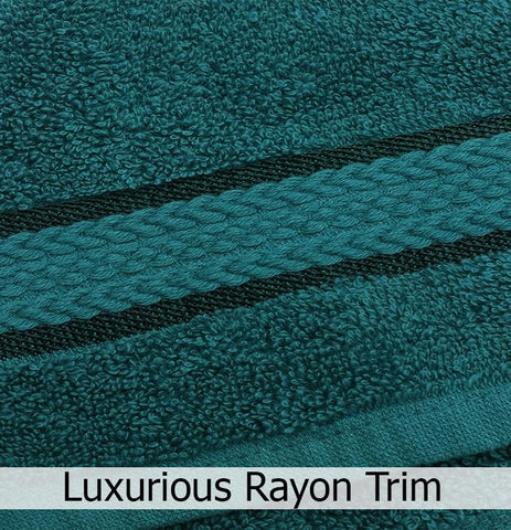 COTTON CRAFT Ultra Soft teal hand towels highlight compact luxury and quick-dry feel.