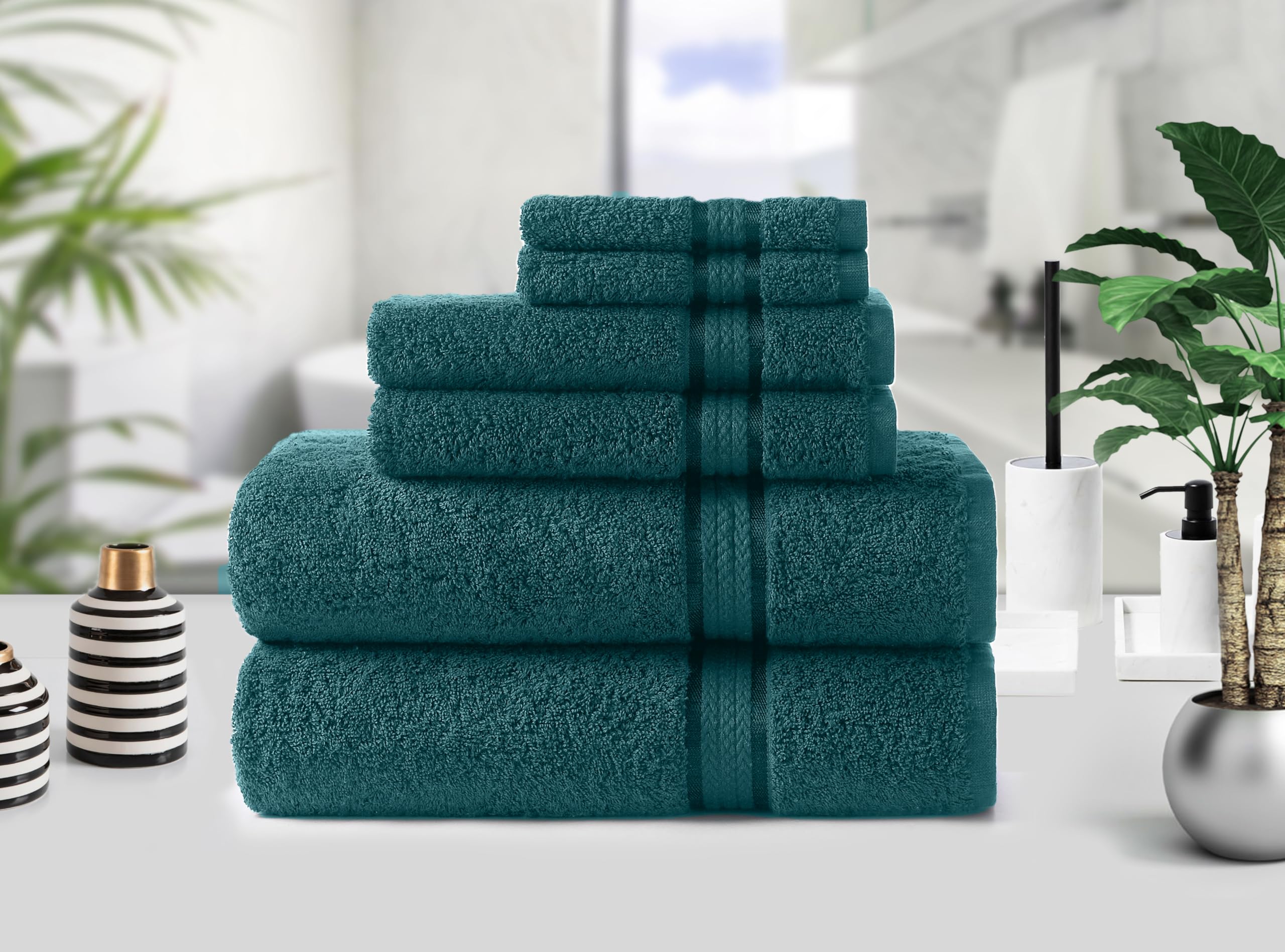 COTTON CRAFT Ultra Soft teal washcloths offer gentle scrubbing and everyday softness.