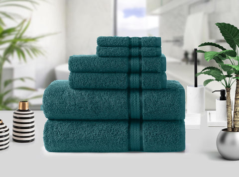 COTTON CRAFT Ultra Soft teal washcloths offer gentle scrubbing and everyday softness.
