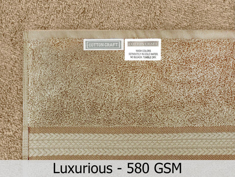 COTTON CRAFT ultra-soft towel spread on counter conveys ready-for-use luxury